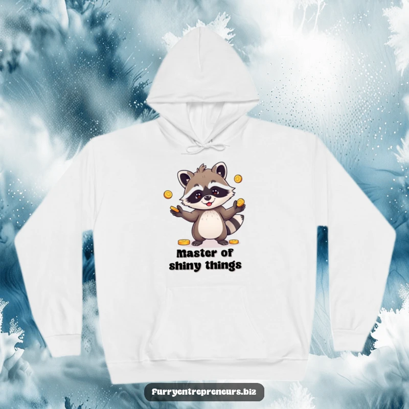 Funny hoodie with a playful raccoon character juggling coins, exuding warmth and mischievous charm.